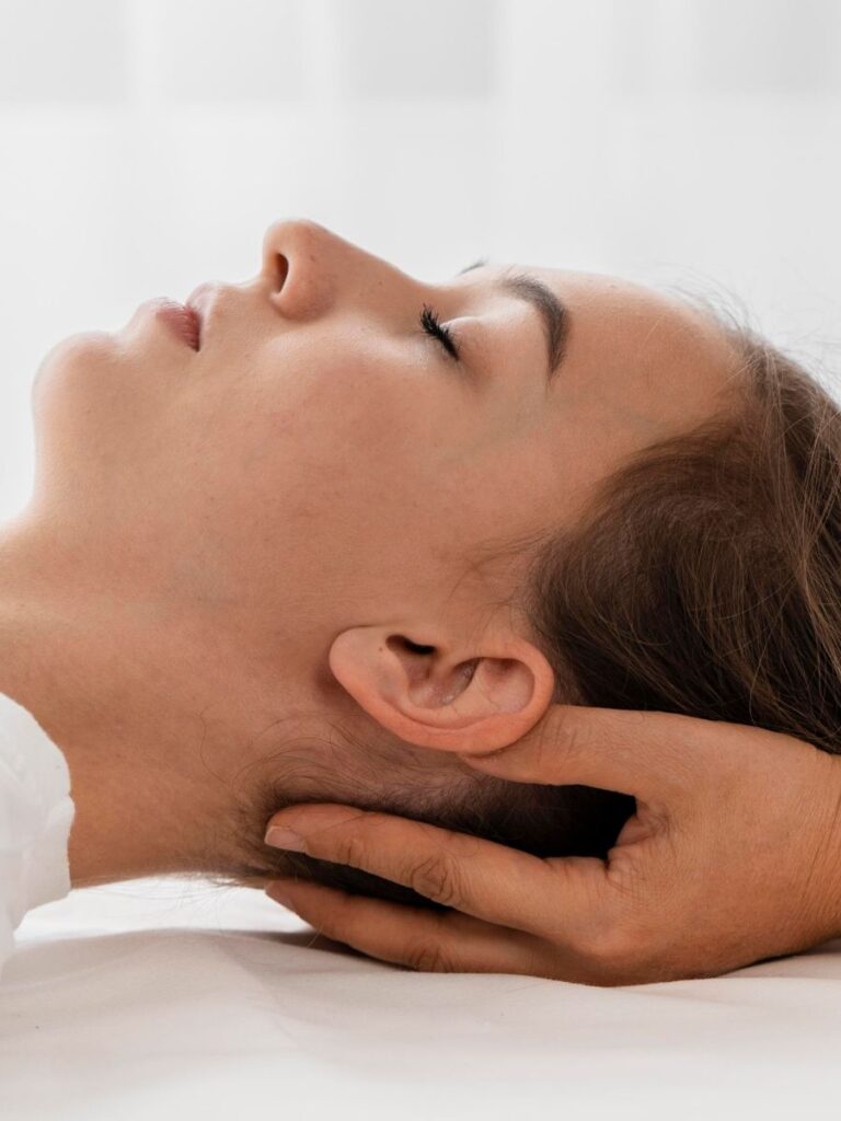 craniosacral therapy in boise being performed on a womans head